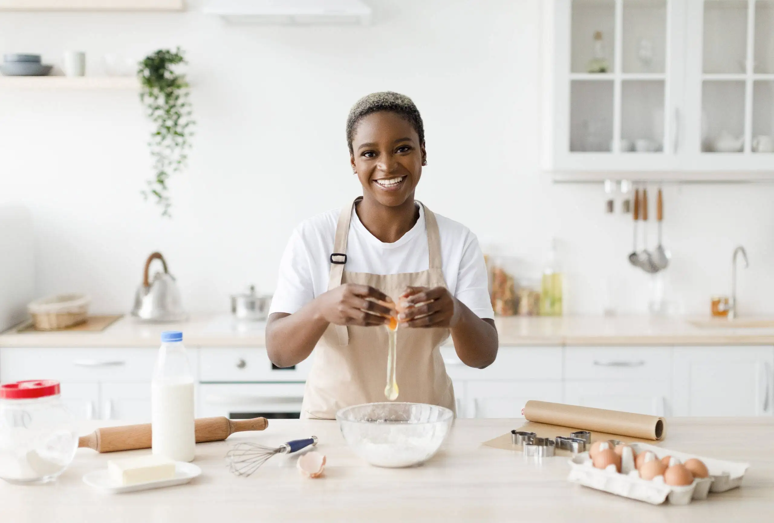 Cheerful Young Women making a cake - Sugarspoon Desserts